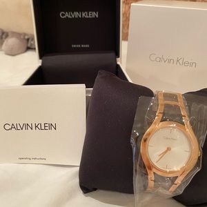 CK rosegold watch included with the box.